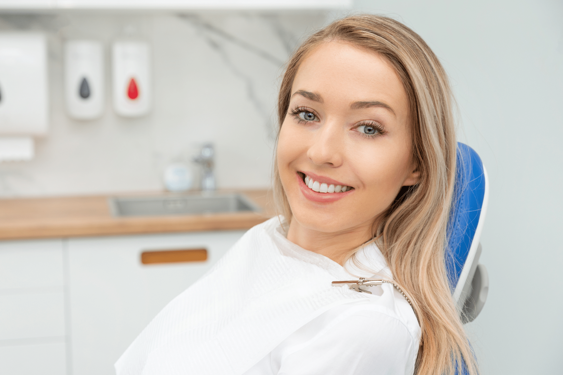 Adult patient smiling during a dental visit in Winchester VA